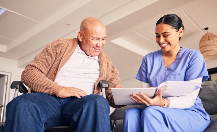 Nurse or caregiver with senior man.