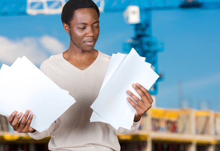 Woman with a lot of paperwork