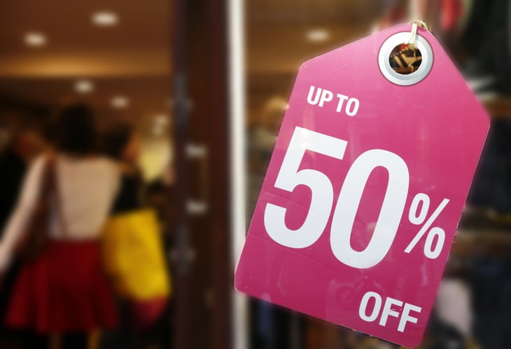 A sale sign at a retail store
