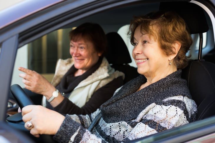 women in a car