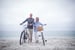 Senior Couple Beach Bikes